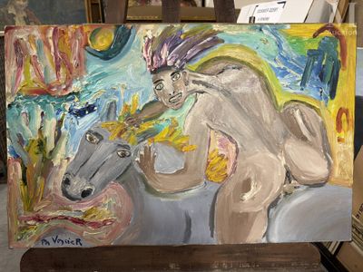 un tableau représentant un homme à cheval, posé sur un chevalet