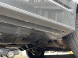 a close up of a truck with a flat tire