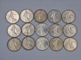 a close up of a bunch of coins sitting on top of a table