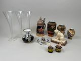 many different vases and vases sitting on a table