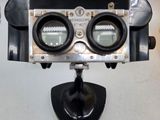 a camera that is sitting on a stand