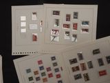 several different types of stamps are displayed on a black surface