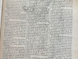 a book with writing on it sitting on a table