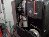 a black box with a red and black device in it