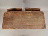 a wooden box that has a handle on it