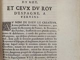 an old book with a black and white image on it