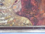 a picture of a painting of a woman on a wall