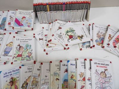 many children ' s books that are on the table