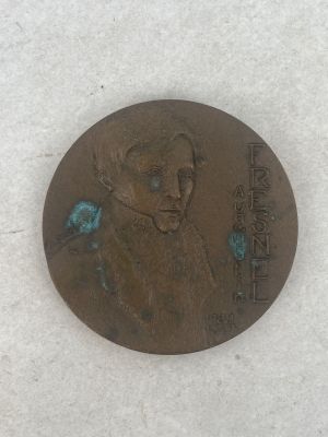 a picture of a coin with a picture of a man on it