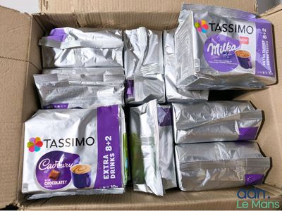 a box of assorted coffees in a cardboard box