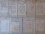 a lot of old papers on the wall
