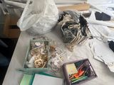 a table with a lot of items on it in a room