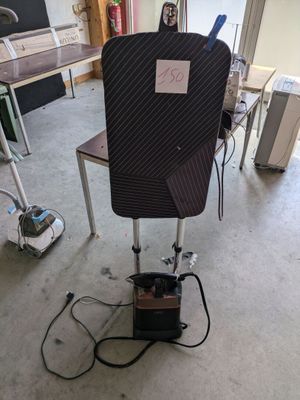 an image of a chair in a room with a sign on the back of it