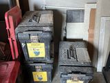 many boxes that are sitting on the floor next to each other