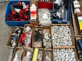 many boxes of assorted items sitting on the floor
