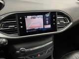 the interior of a car with a gps device on the dashboard