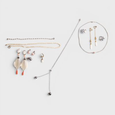 a collection of jewellery including a necklace, bracelet and earrings