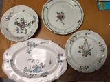 four plates that are sitting on a table