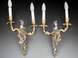 a pair of antique wall sconces