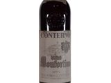 a bottle of wine that is sitting on a table