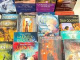 a lot of books that are sitting on a table