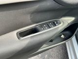 a close up of a door handle in a car