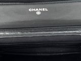 the inside of a black bag with a logo on it