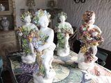 a table with a bunch of figurines on top of it