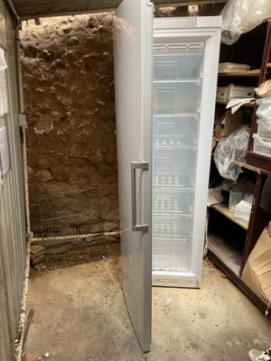 an image of a refrigerator that is in a room