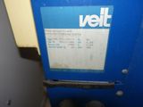 an image of a blue machine with a label on it