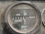 a close up of a gauge on a car ' s dashboard