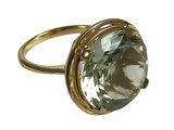 an image of a gold ring with a green quartz stone