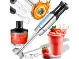 a blender with a strawberries in it and a shaker with a strawberries in it