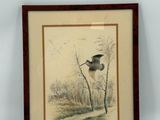 painting of a bird flying over a tree in a wood frame