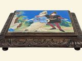 an image of a wooden box with a painting of a man and a woman on it