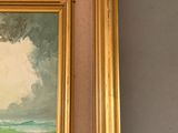 a picture of a painting hanging on a wall