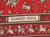 hermes paris silk tie with elephants and horses on red background