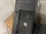 a computer tower that is sitting on top of a desk
