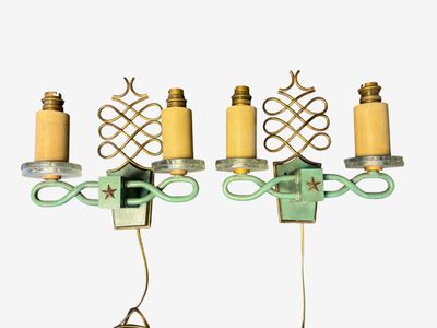 pair of vintage wall lights in the shape of a three light fixture