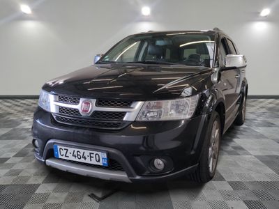 a picture of a black suv parked in a garage