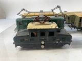 three toy trains that are sitting on a table