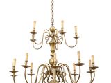 a large brass chandelier with six arms and eight lights