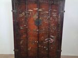 an image of a wooden cabinet sitting on top of a hard wood floor