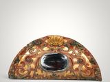 a small decorative object that is sitting on a table