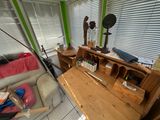 a living room with a couch, table, and a television