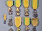 many medals and medals displayed on a wall