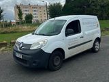 a white van that is parked on the side of the road
