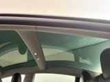 a view of the sunroof from inside of a car
