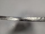 a close up of a knife on a table