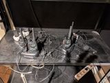 two cell phones that are sitting on a table